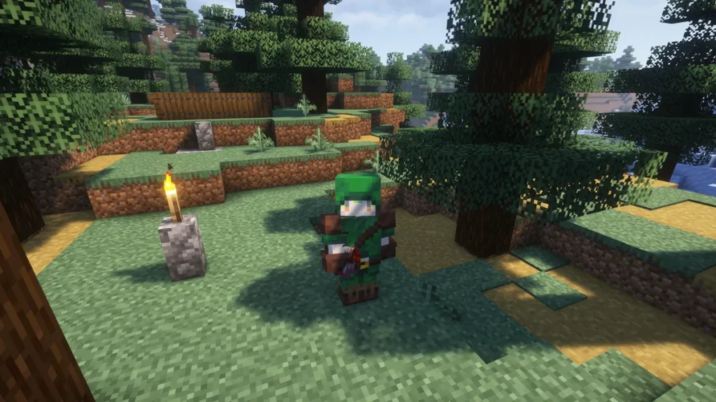 森林地帯で緑の弓兵装備を着たキャラクターが立つ様子。近くには松明が灯された石の柱がある。