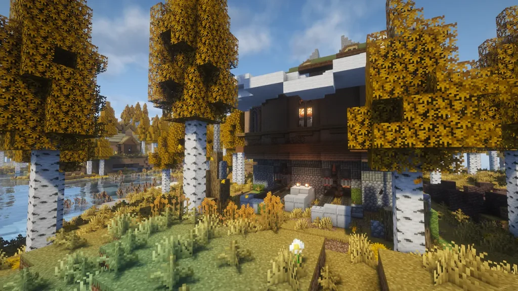 Minecraftの秋のバイオーム（白樺の森）に建つ、工業化Mod「Create」を用いた石と木造の2階建て拠点。拠点周辺にはアイテム輸送用のベルトコンベアが設置され、紅葉した白樺の木々と川、湿地が広がっている。