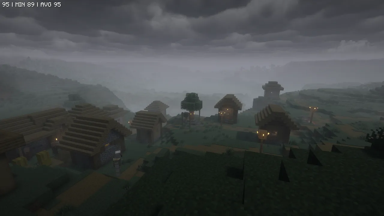 ホラー特化の「Spooklementary」シェーダーを適用した、非常に暗く不気味な村。厚い雲に覆われた空と低い視認性が、プレイヤーに強い圧迫感を与えます。