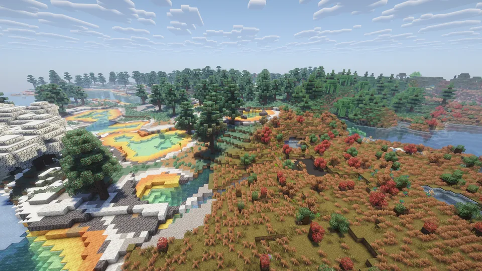 MinecraftのModによって拡張された、色彩豊かなバイオームの俯瞰映像。手前には赤や茶色の草木が広がる荒野、中央にはエメラルドグリーンやオレンジ色の水辺が点在し、奥には針葉樹林と雪山が広がる多様な自然環境が描かれています。